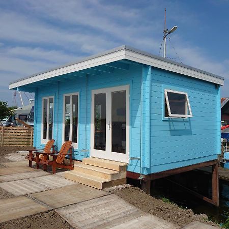 Waterhuisjes Op De Pier Van Lauwersmeerplezier! เลาเวอร์ชูก ภายนอก รูปภาพ