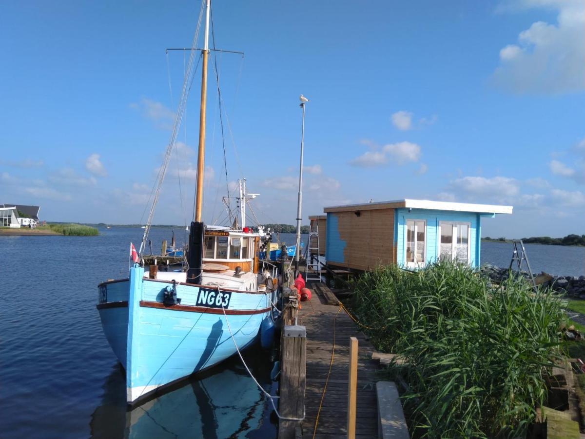 Waterhuisjes Op De Pier Van Lauwersmeerplezier! เลาเวอร์ชูก ภายนอก รูปภาพ