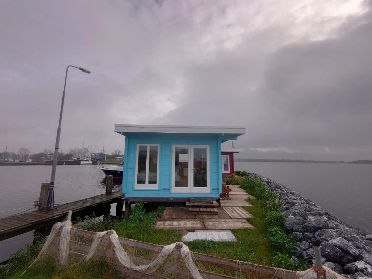 Waterhuisjes Op De Pier Van Lauwersmeerplezier! เลาเวอร์ชูก ภายนอก รูปภาพ